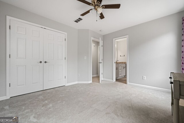 1010 Longcreek Pointe Pointe, Alpharetta, GA 30005 - unfurnished bedroom with carpet flooring, baseboards, a closet, a ceiling fan, and ensuite bathroom
