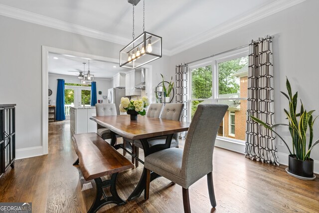 1010 Longcreek Pointe Pointe, Alpharetta, GA 30005 - dining room featuring french doors, baseboards, wood finished floors, crown molding, and a chandelier