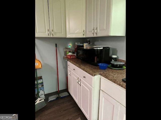 6305 Eidson Dr, Cumming, GA 30041 - kitchen with white cabinetry and dark wood-style flooring