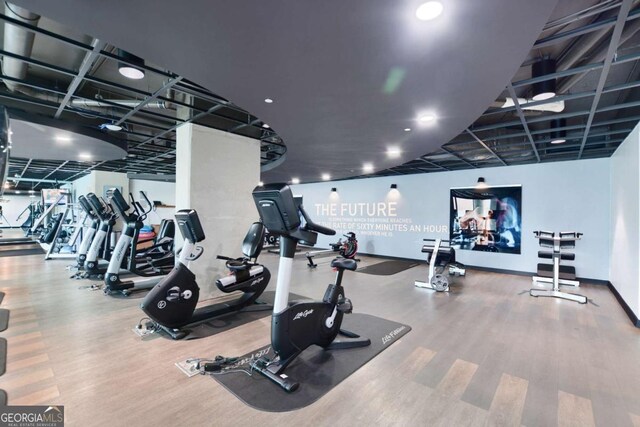 361 17th St NW Unit 1702, Atlanta, GA 30363 - gym featuring wood finished floors and baseboards