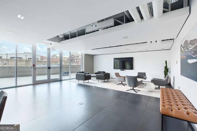 361 17th St NW Unit 1702, Atlanta, GA 30363 - building lobby featuring a wall of windows