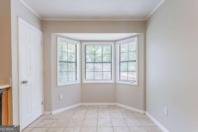 1214 Tyne Way, Stone Mountain, GA 30088 - spare room with crown molding, baseboards, and light tile patterned floors