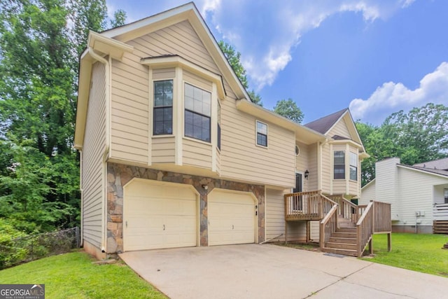 1214 Tyne Way, Stone Mountain, GA 30088 - view of front of property with an attached garage, concrete driveway, a front lawn, and stone siding