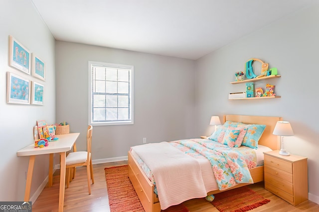 1214 Tyne Way, Stone Mountain, GA 30088 - bedroom with light wood-style floors and baseboards