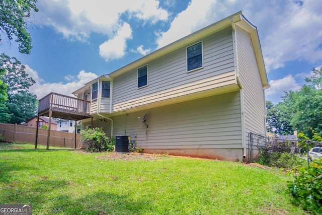 1214 Tyne Way, Stone Mountain, GA 30088 - back of property featuring central AC unit and a deck