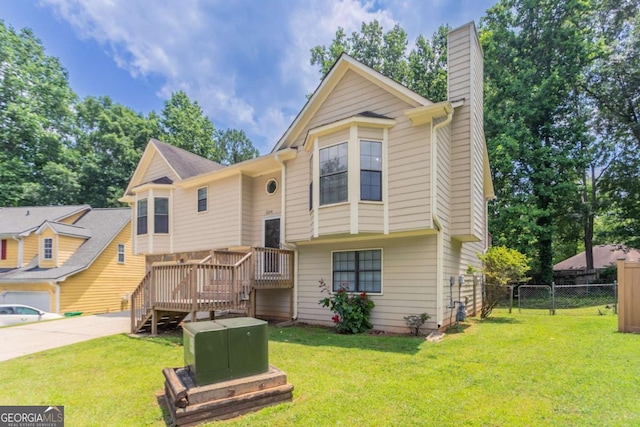 1214 Tyne Way, Stone Mountain, GA 30088 - view of front facade with a chimney and a deck