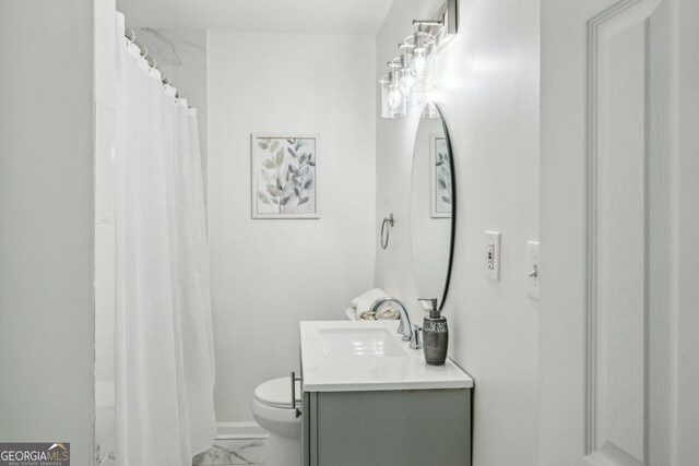 2485 Hillside Ave, Decatur, GA 30032 - bathroom featuring vanity, marble finish floors, toilet, a shower with shower curtain, and baseboards