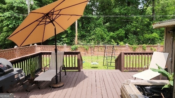 617 Willard Ave, Albany, GA 31701 - wooden deck featuring a fenced backyard and view of scattered trees