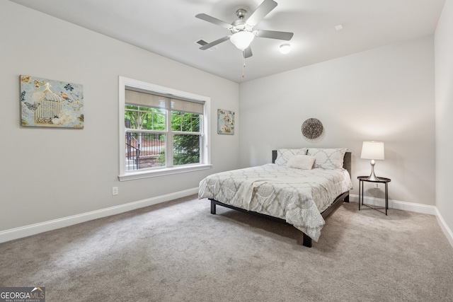 4012 Townsend Ln, Dunwoody, GA 30346 - carpeted bedroom featuring baseboards and a ceiling fan
