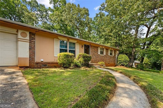 1594 Pine Glen Cir, Decatur, GA 30035 - single story home with a front lawn, a garage, driveway, brick siding, and crawl space