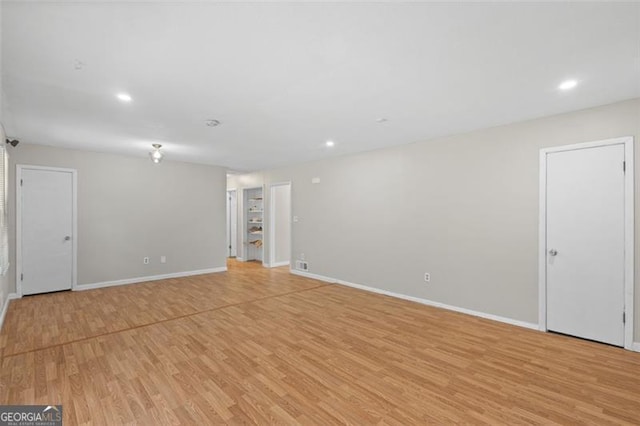 1594 Pine Glen Cir, Decatur, GA 30035 - empty room with light wood-style floors and recessed lighting