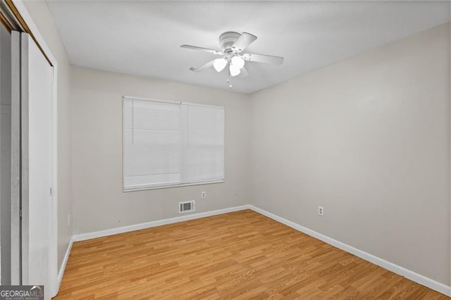 1594 Pine Glen Cir, Decatur, GA 30035 - unfurnished bedroom featuring light wood-style flooring, a closet, and ceiling fan
