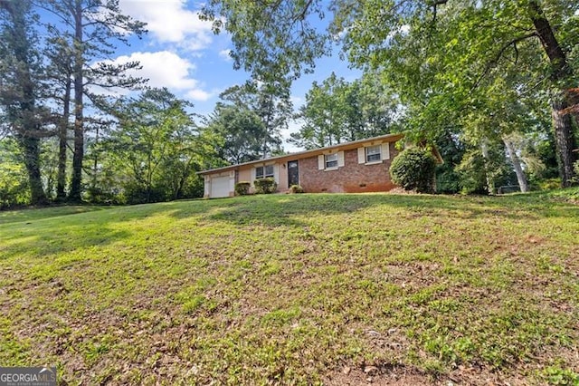 1594 Pine Glen Cir, Decatur, GA 30035 - view of grassy yard with a garage