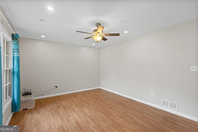 1594 Pine Glen Cir, Decatur, GA 30035 - unfurnished room featuring a ceiling fan, light wood finished floors, and recessed lighting