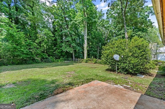 1594 Pine Glen Cir, Decatur, GA 30035 - view of grassy yard featuring a patio area