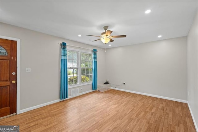 1594 Pine Glen Cir, Decatur, GA 30035 - spare room featuring light wood-type flooring, ceiling fan, and recessed lighting