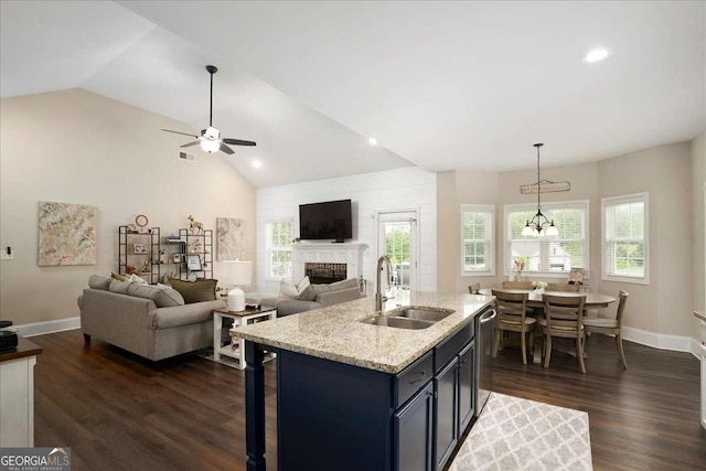 255 Solihull Ln, Athens, GA 30605 - kitchen with a sink, a fireplace, baseboards, vaulted ceiling, and dark wood finished floors