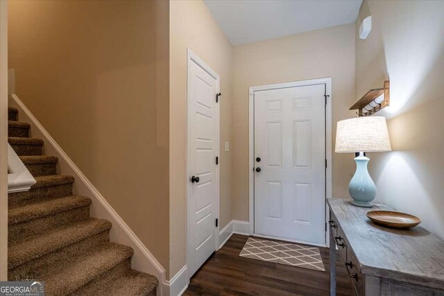 255 Solihull Ln, Athens, GA 30605 - entryway featuring dark wood-style floors, stairway, and baseboards