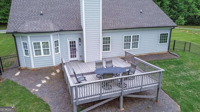 255 Solihull Ln, Athens, GA 30605 - rear view of property featuring outdoor dining area, a deck, a shingled roof, and a chimney