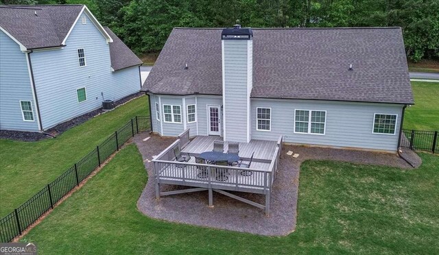 255 Solihull Ln, Athens, GA 30605 - rear view of property featuring a deck, a chimney, central AC unit, and roof with shingles