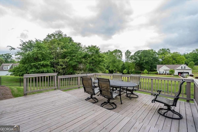 255 Solihull Ln, Athens, GA 30605 - wooden terrace featuring outdoor dining area and view of scattered trees