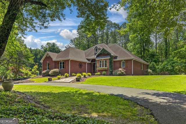 312 Sterling Rd, Jasper, GA 30143 - view of front of property with brick siding and a front yard