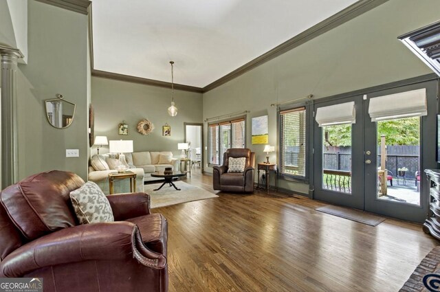 312 Sterling Rd, Jasper, GA 30143 - living room featuring french doors, wood finished floors, ornamental molding, a high ceiling, and ornate columns