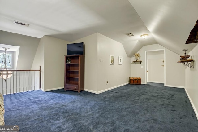 312 Sterling Rd, Jasper, GA 30143 - additional living space featuring dark colored carpet, lofted ceiling, and baseboards