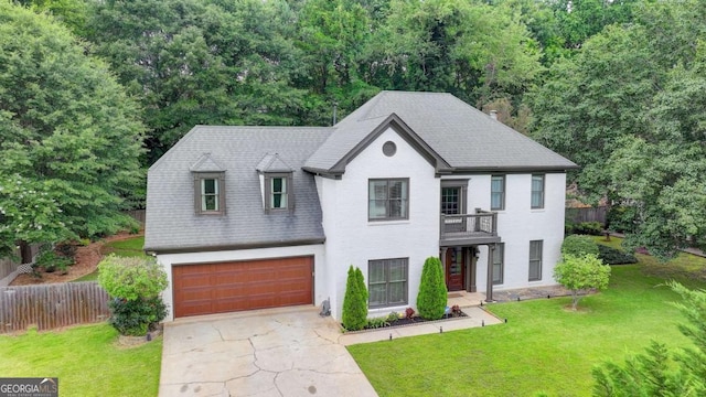 3085 Saint Andrews Dr, Duluth, GA 30096 - view of front of home featuring concrete driveway, an attached garage, a balcony, and roof with shingles