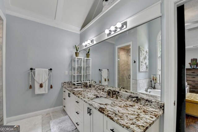 3085 Saint Andrews Dr, Duluth, GA 30096 - bathroom with double vanity, a stall shower, a bath, vaulted ceiling, and marble look tile flooring
