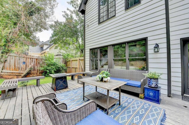 3085 Saint Andrews Dr, Duluth, GA 30096 - wooden terrace featuring an outdoor living space with a fire pit