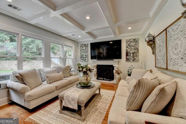 3085 Saint Andrews Dr, Duluth, GA 30096 - living room featuring coffered ceiling, wood finished floors, beamed ceiling, recessed lighting, and a fireplace