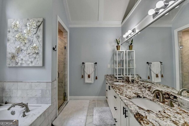 3085 Saint Andrews Dr, Duluth, GA 30096 - full bath with a stall shower, double vanity, a bath, and baseboards