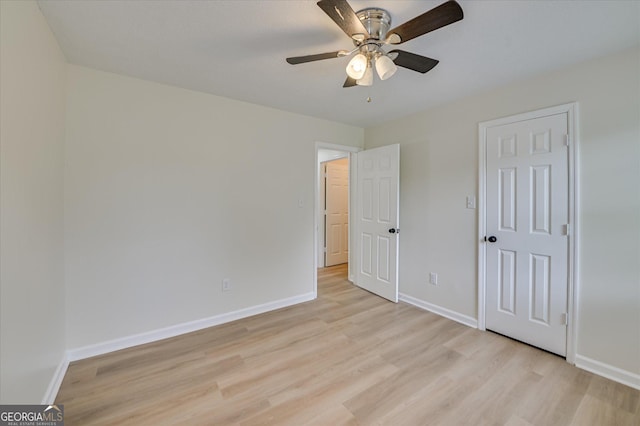 2011 Mims Rd, Hephzibah, GA 30815 - unfurnished bedroom with light wood-style floors and ceiling fan