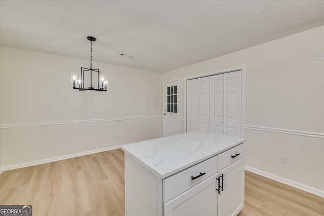 2011 Mims Rd, Hephzibah, GA 30815 - unfurnished dining area with a chandelier and light wood finished floors