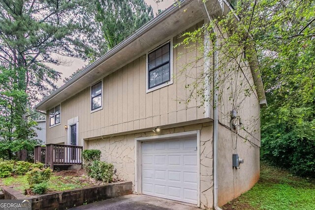 2139 Jonathan Ave, Lithonia, GA 30058 - view of side of property featuring a garage