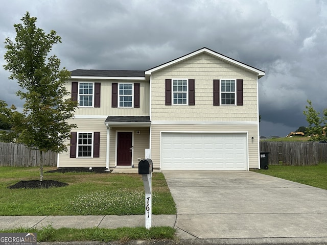 761 Riverside Dr NW, Calhoun, GA 30701 - traditional-style house with driveway and an attached garage