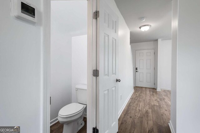 761 Riverside Dr NW, Calhoun, GA 30701 - hall featuring wood finished floors and baseboards