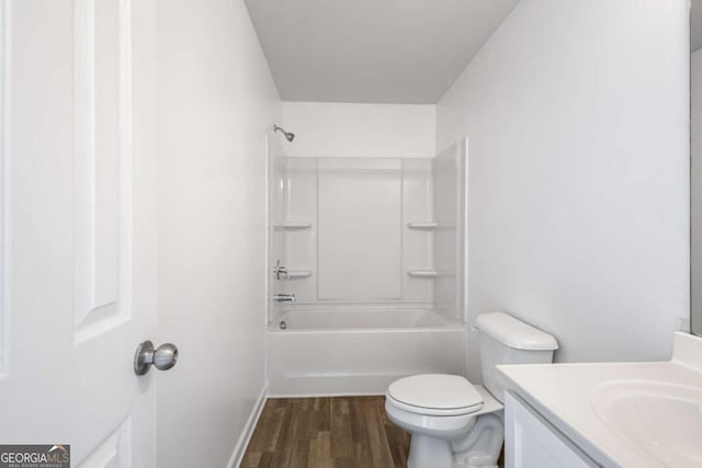 761 Riverside Dr NW, Calhoun, GA 30701 - bathroom featuring vanity, wood finished floors, and bathing tub / shower combination