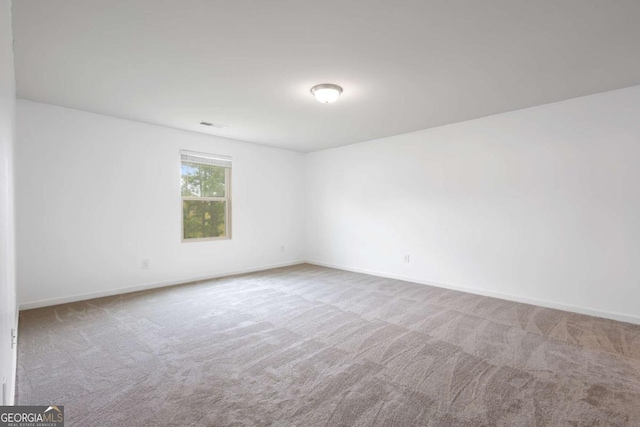 761 Riverside Dr NW, Calhoun, GA 30701 - carpeted spare room with baseboards