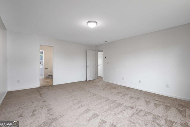 761 Riverside Dr NW, Calhoun, GA 30701 - carpeted spare room featuring baseboards