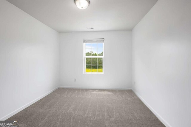 761 Riverside Dr NW, Calhoun, GA 30701 - spare room with carpet floors