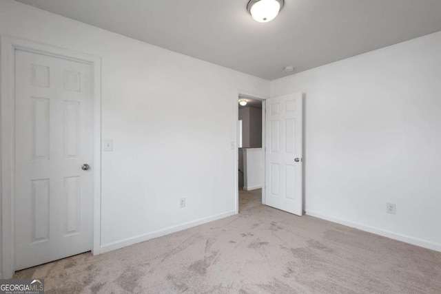 761 Riverside Dr NW, Calhoun, GA 30701 - unfurnished bedroom with baseboards and carpet floors