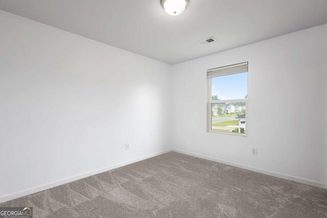 761 Riverside Dr NW, Calhoun, GA 30701 - spare room with carpet and baseboards