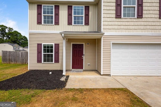 761 Riverside Dr NW, Calhoun, GA 30701 - traditional-style house with driveway and an attached garage