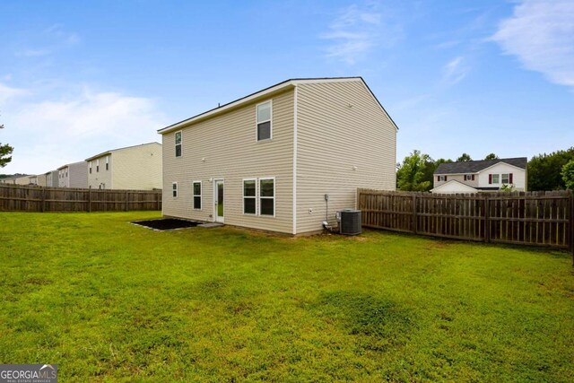 761 Riverside Dr NW, Calhoun, GA 30701 - rear view of house with a fenced backyard
