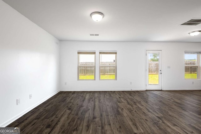 761 Riverside Dr NW, Calhoun, GA 30701 - spare room featuring dark wood-style floors and baseboards