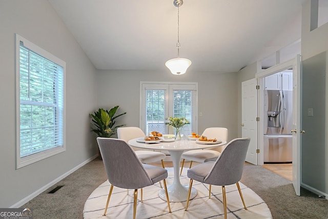 2140 Deer Trl, Suwanee, GA 30024 - dining area featuring light carpet and baseboards