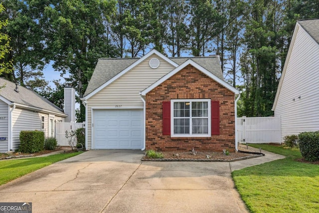 2657 Albion Farm Way, Duluth, GA 30097 - view of front of property with brick siding, driveway, a garage, and a shingled roof