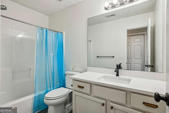 2657 Albion Farm Way, Duluth, GA 30097 - bathroom with vanity, a textured ceiling, and shower / bath combo with shower curtain